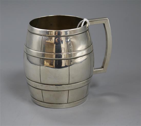 A sterling silver barrel shaped mug, maker C & K, 7.5 oz.